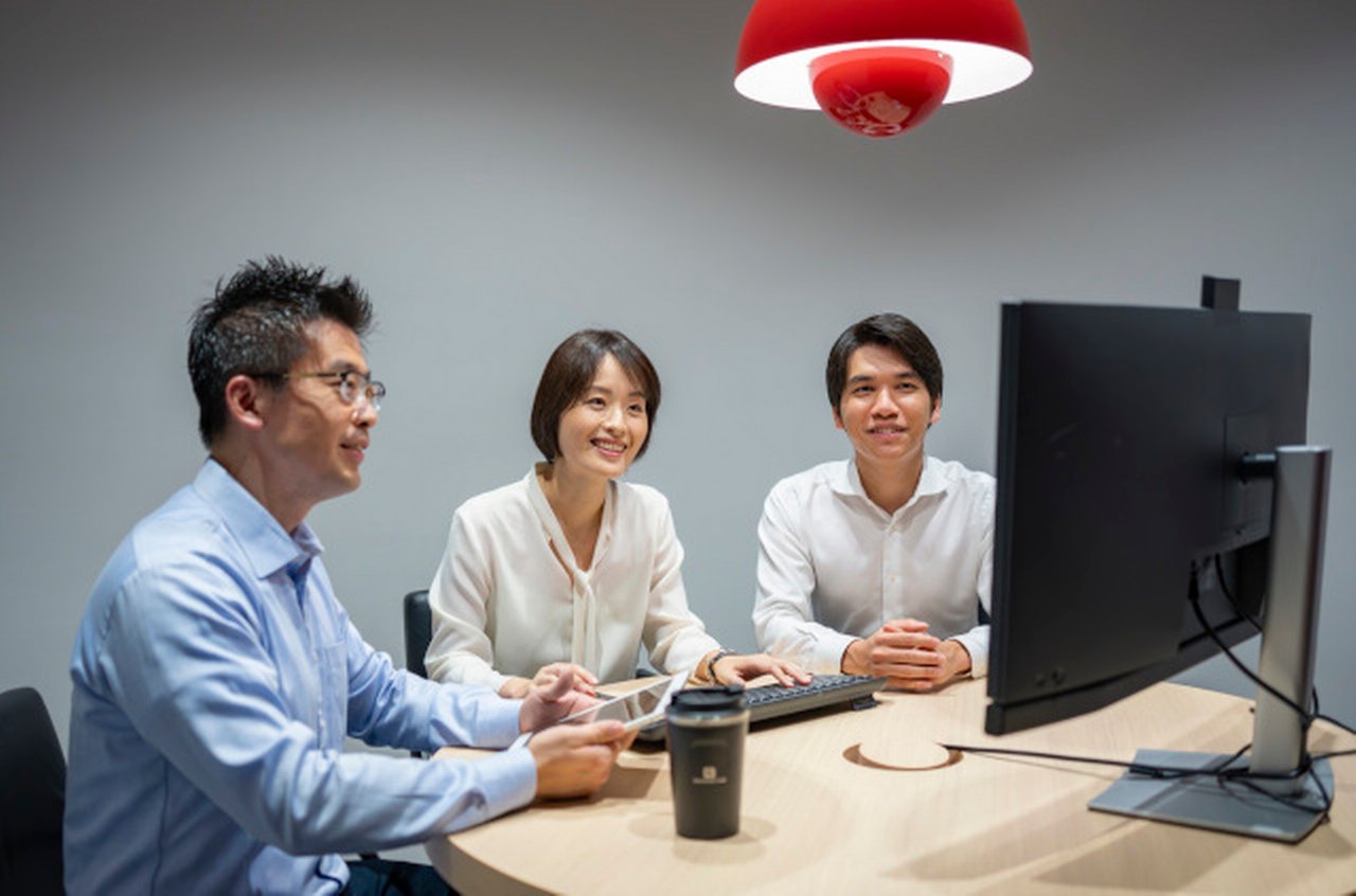 employees on a desk