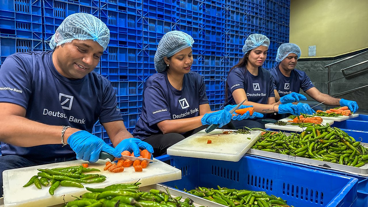 Volunteers preparing mid days meals for children studying in government schools